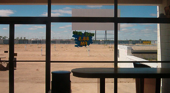 The Odeon Drive-In's screen from just inside the concession building